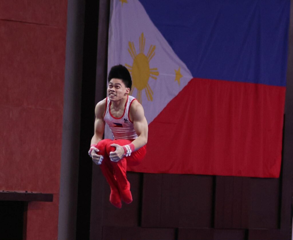 Karl Eldrew Yulo does in action in the parallel bar finals in the 3rd FIG Artistic Gymnastics Junior World Championships at the Manila Marriott Grand Ballroom at the Newport World Resorts in Pasay City. [photo credit: Philippine Sports Commission]