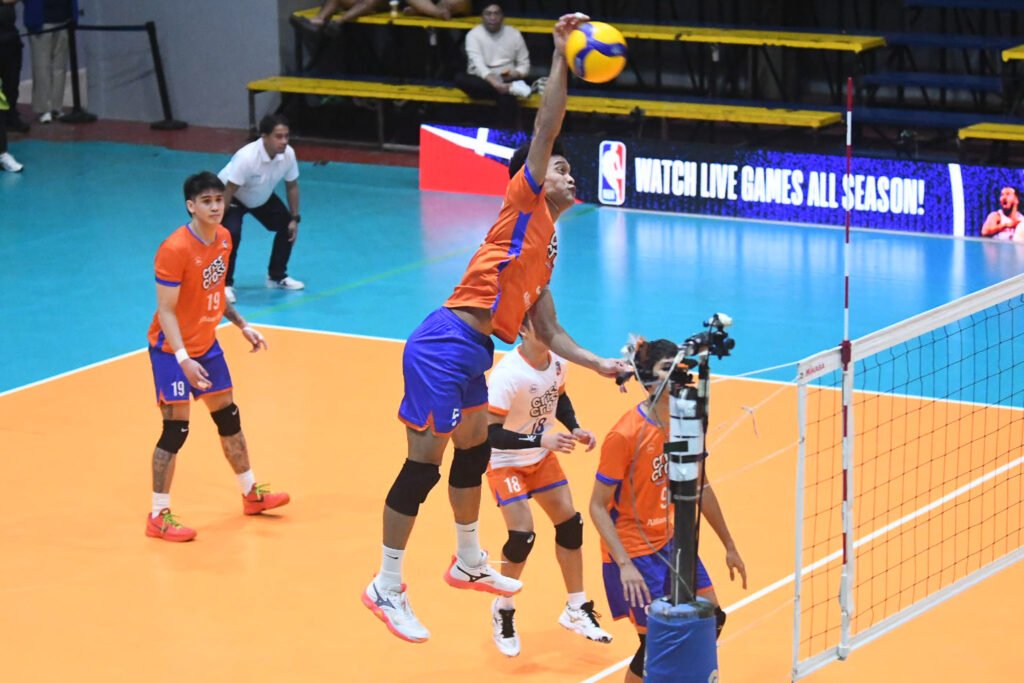 Jude Garcia spikes the ball to lead the King Crunchers. [Spikers' Turf photo]