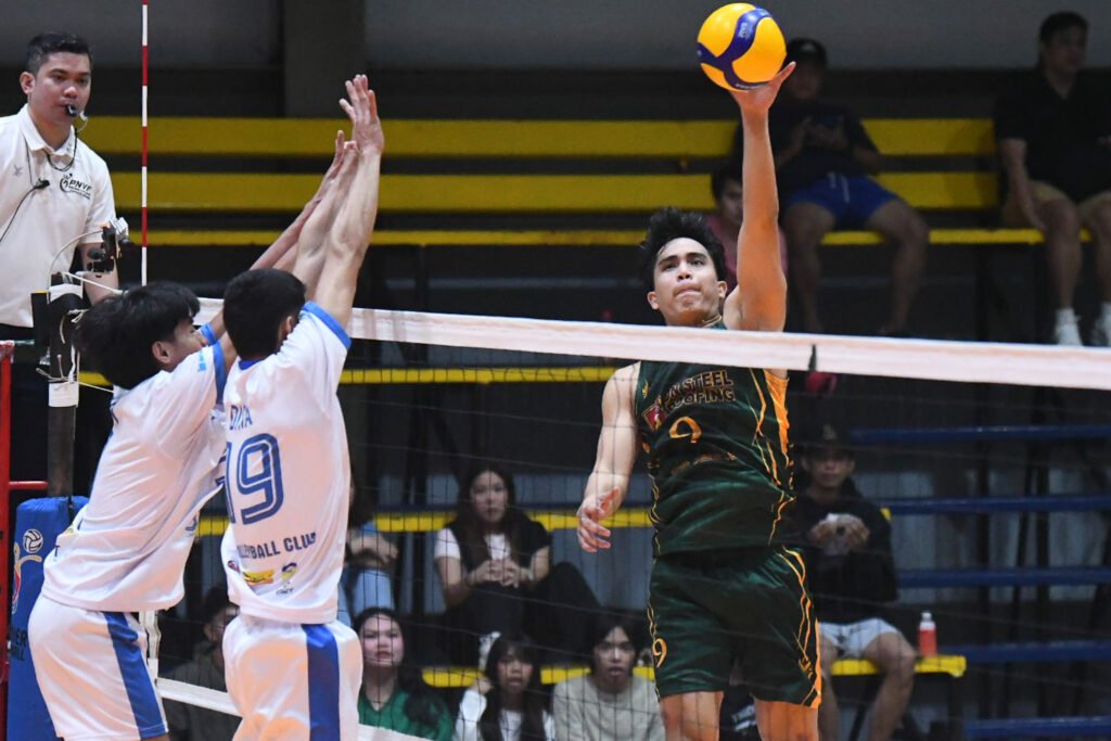 Dryx Saavedra spikes the ball for the Tamaraws during Friday’s match. [Spikers' Turf photo]