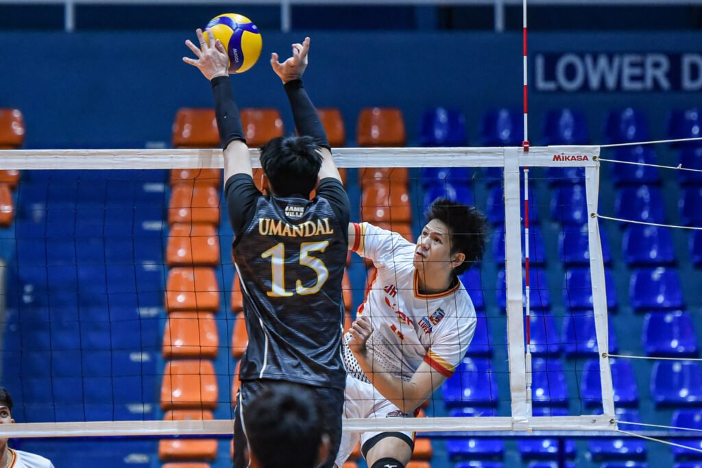 Jau Umandal fires a powerful attack against UST-Gameville in the semifinals. [Spikers Turf photo]