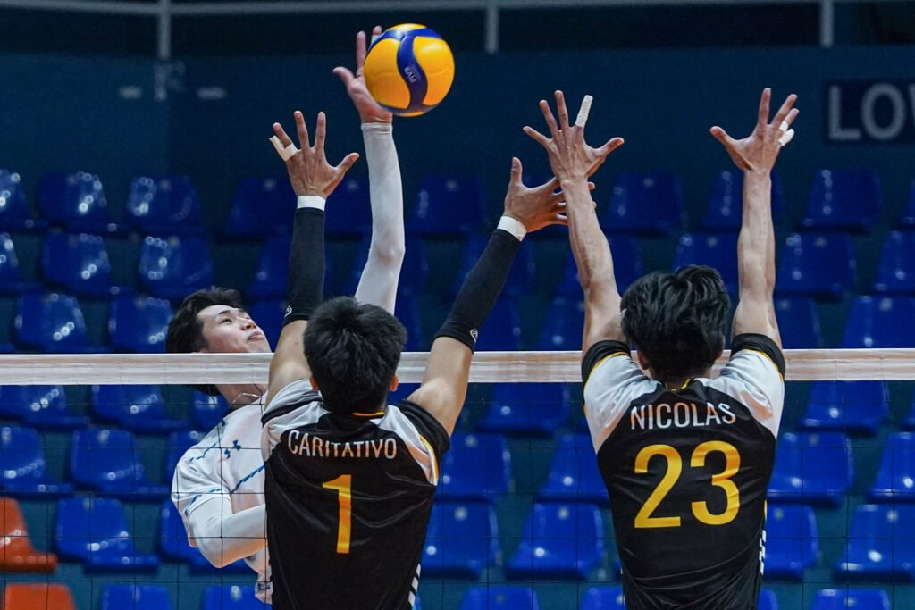 Ryutaro Aun delivers a spike to help Kindai University secure a finals berth. [Spikers Turf photo]