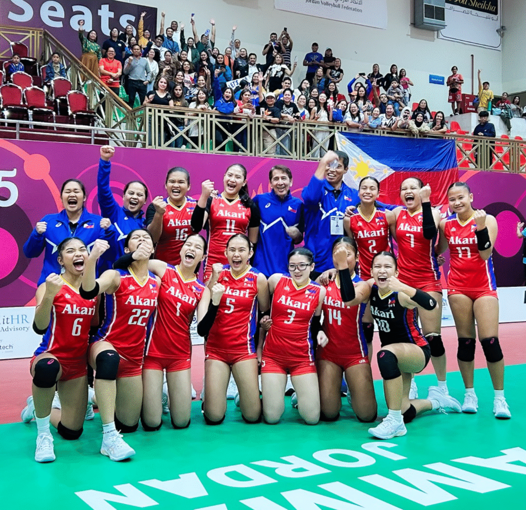 THE Alas Pilipinas girls team are a cheerful bunch—and so ar the Filipino fans in the background—after their victory over Iran. They are (front row, from lef) Nadeth Herbon, Megan Hernandez, Kimberly Peralta, Jhenica Sadia, Mischa Ambrocio, Princess Sajulga and Frances Ramos; and (back row, from (left) Hannah Grace De Luna (PT), Lerma Giron (assistant coach, Madele Gale, Xyz Rayco, Edwin Leyva (head coach), Oliver Balse (assistant Coach), Merish Beltran, Resty Jane Olaguir and Kristel Mirasol. [photo credit: PNVF]
