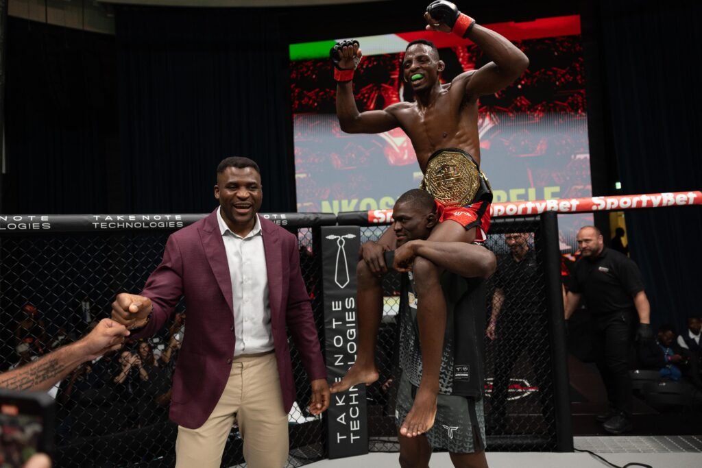 Nkosi Ndebele celebrates after capturing the inaugural PFL Africa Bantamweight title. [PFL photo]