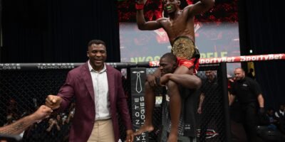 Nkosi Ndebele celebrates after capturing the inaugural PFL Africa Bantamweight title. [PFL photo]