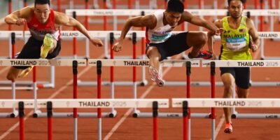 Tolentino clears the final hurdle en route to gold at the Supachalasai National Stadium. [POC Media Pool]