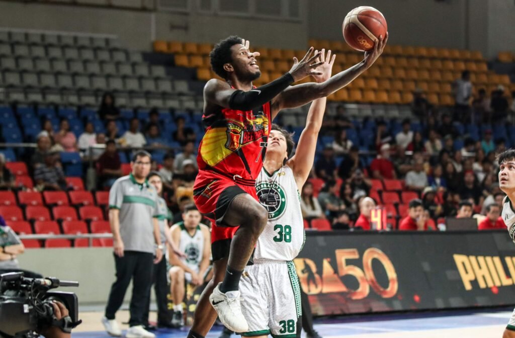 CJ Perez drives past Terrafirma defenders en route to 26 points in San Miguel’s win. [PBA Images]