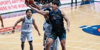 Coach Luigi Trillo applauds CJ Cansino’s defensive and offensive performance. [PBA Images]