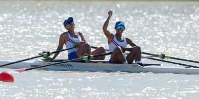 Joanie Delgaco and Kristine Paraon celebrate after winning gold in the women’s 2,000-meter rowing event at the SEA Games in Rayong. [POC Media Pool]