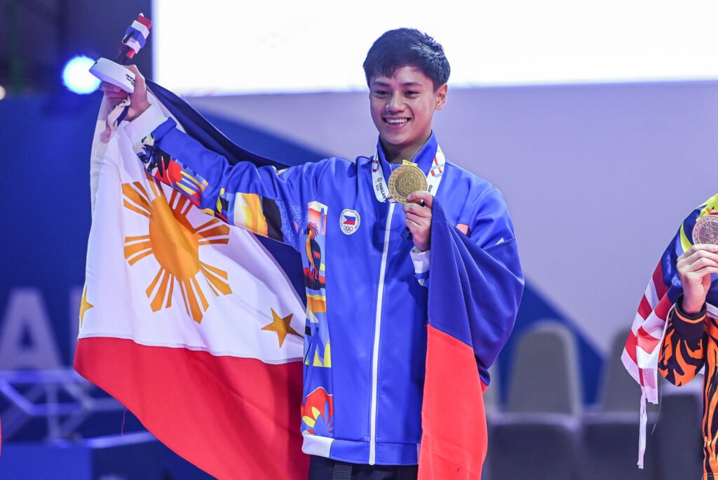 Macario celebrates after clinching the Philippines’ first gold medal of the SEA Games. [POC Media Pool photo]