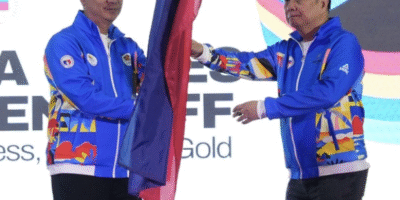 PHILIPPINE Olympic Committee president Abraham “Bambol” Tolentino and Philippine Sports Commission chairman Patrick “Patò” Gregorio are clad in the Thailand SEA Games version of the national track suit, while medalist Muay athletes Zeth Gabriel Bueno, Jan Brix Ramiscal, Jasmine dagame, Tyron Jamborillowear the Bahrain Asian Youth Games design. [POC photo]