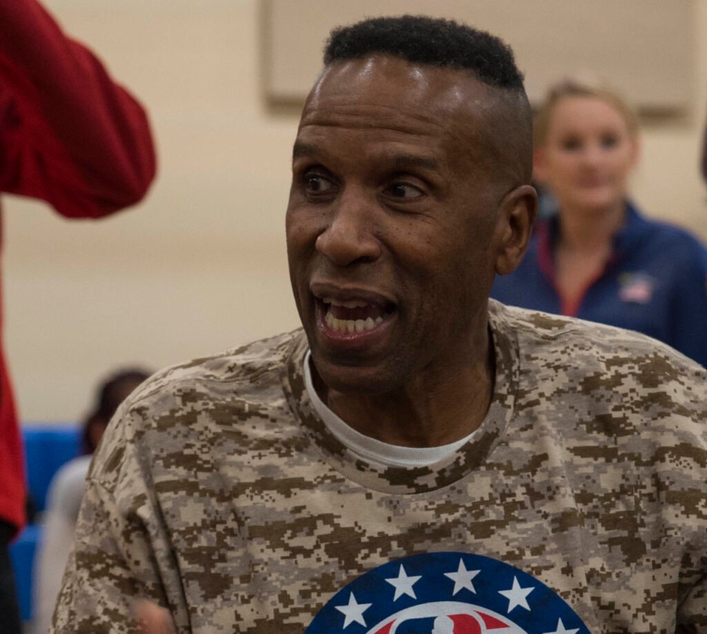 Adrian Dantley [photo credit: By U.S. Navy photo by Mass Communication Specialist 2nd Class William Phillips/Released - https://www.flickr.com/photos/nsabethesda/38259978012, Public Domain, https://commons.wikimedia.org/w/index.php?curid=85220827