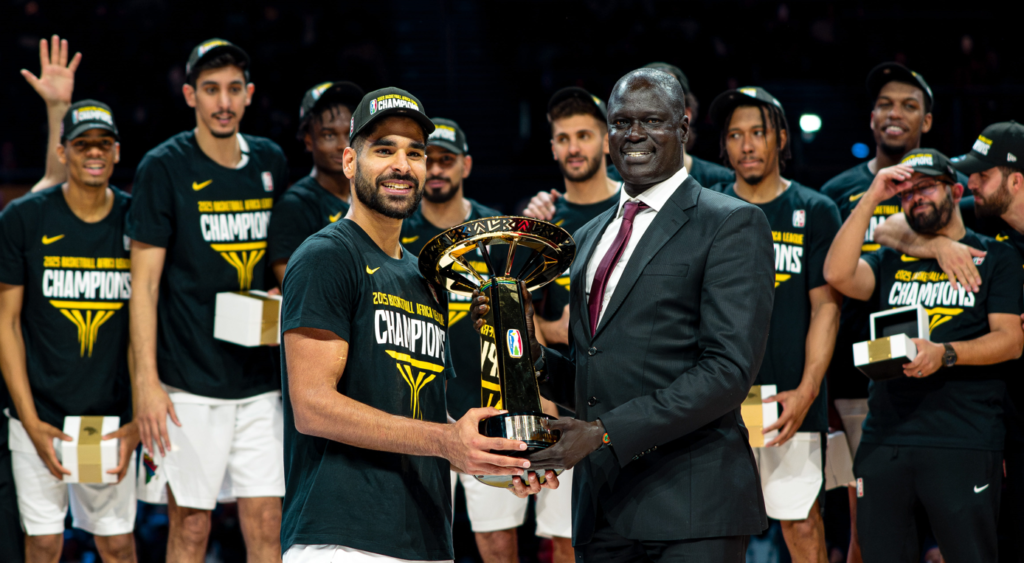 Alahli Tripoli celebrates after winning the 2025 BAL Championship against Petro de Luanda on June 14, 2025 at the SunBet Arena in Pretoria, South Africa [Credit: BAL/Getty Images]