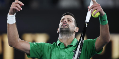 Djokovic acknowledges the crowd after recording his 400th grand slam match win. [photo credit: Xinhua]