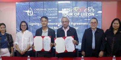 MPTC Tour of Luzon CEO and Chief Organizer Arrey Perez (third from left) and Cardinal Santos Medical Center (CSMC) President and CEO Raul Pagdanganan seal the partnership with (from left) MAD Management Inc. CEO Madeleine Sharon Guico, SDMI Sports president Danica Khaye Baltazar and CSMC vice president and Chief Medical Officer Dr. Antonio Say and senior vice president and Chief Fiance Officer Marivic Mabuti. [ToL Photo]