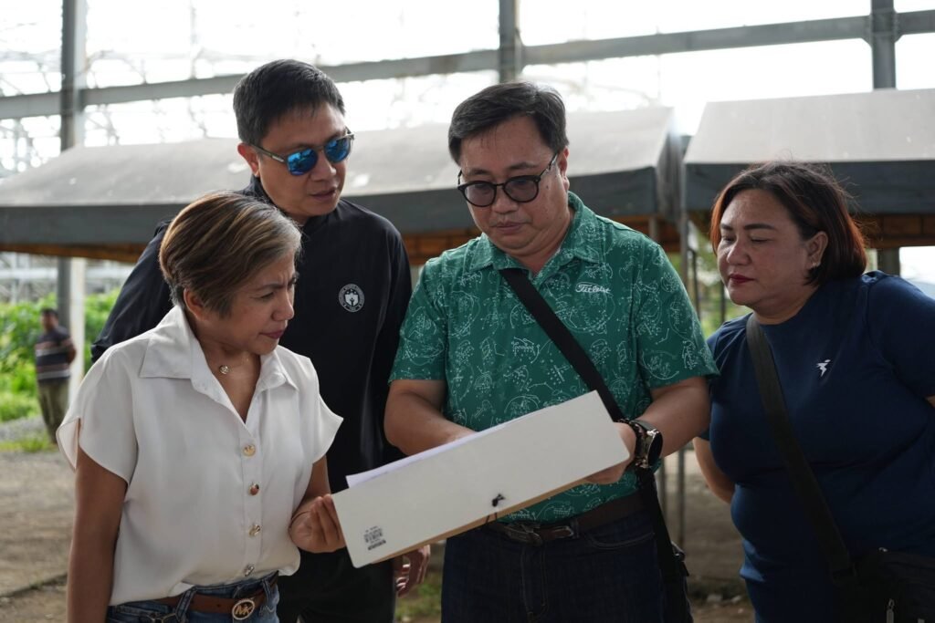 Gregorio at the Visayas Sports Summit in Iloilo City with local officials. [PSC photo]