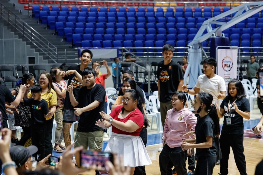 Rookies/Sophomores and Junior squad members interact with local youth during the All-Star weekend activities. [PBA Images]