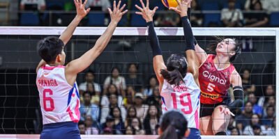 Vanie Gandler attacks through the Creamline block. [PVL Images]