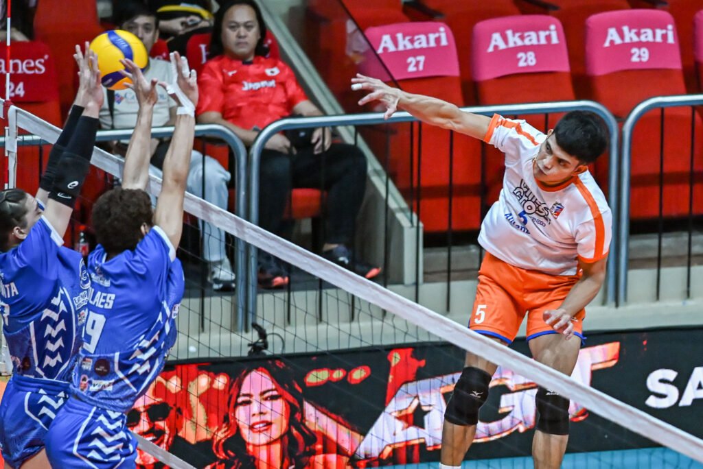 Jude Garcia powers a spike for Criss Cross during its Spikers’ Turf Open Conference match against 3B. [Spikers Turf photo]