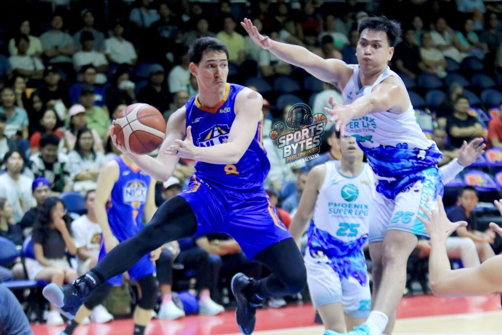 Robert Bolick leads NLEX with 22 points and 14 assists in a commanding win over Phoenix. [photo credit: Peter Baltazar]