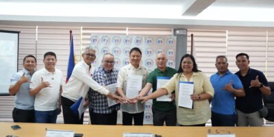 General Luna officials with PSC Commissioner Matthew Gaston, Surigao Del Norte Governor Robert Lyndon Barbers, PSC Chairman Patrick Gregorio, General Luna Municipal Mayor Johnson Sajulga, and Municipal Vice Mayor Doc Minmin Rusillon-Sajulga