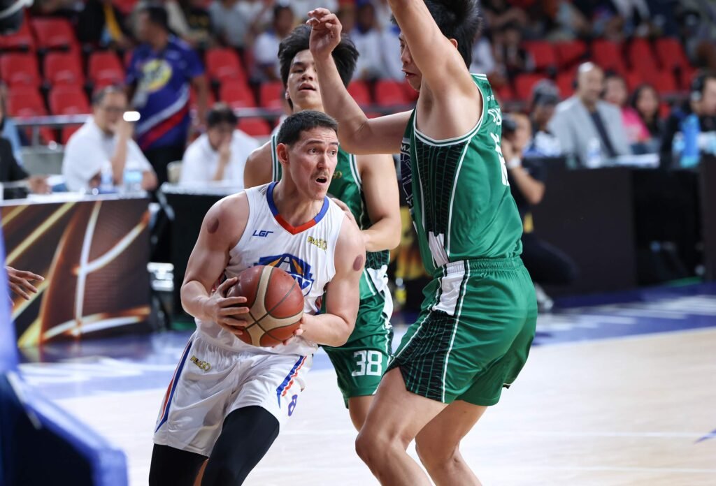 Robert Bolick delivers in the clutch as NLEX survives Maverick Ahanmisi and Terrafirma to book a quarterfinals spot in the PBA Commissioner’s Cup. [PBA Images]