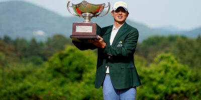 Jiho Yang poses with the KOLON Korea Open trophy after completing a historic victory at Woo Jeong Hills Country Club. [Asian Tour photo]