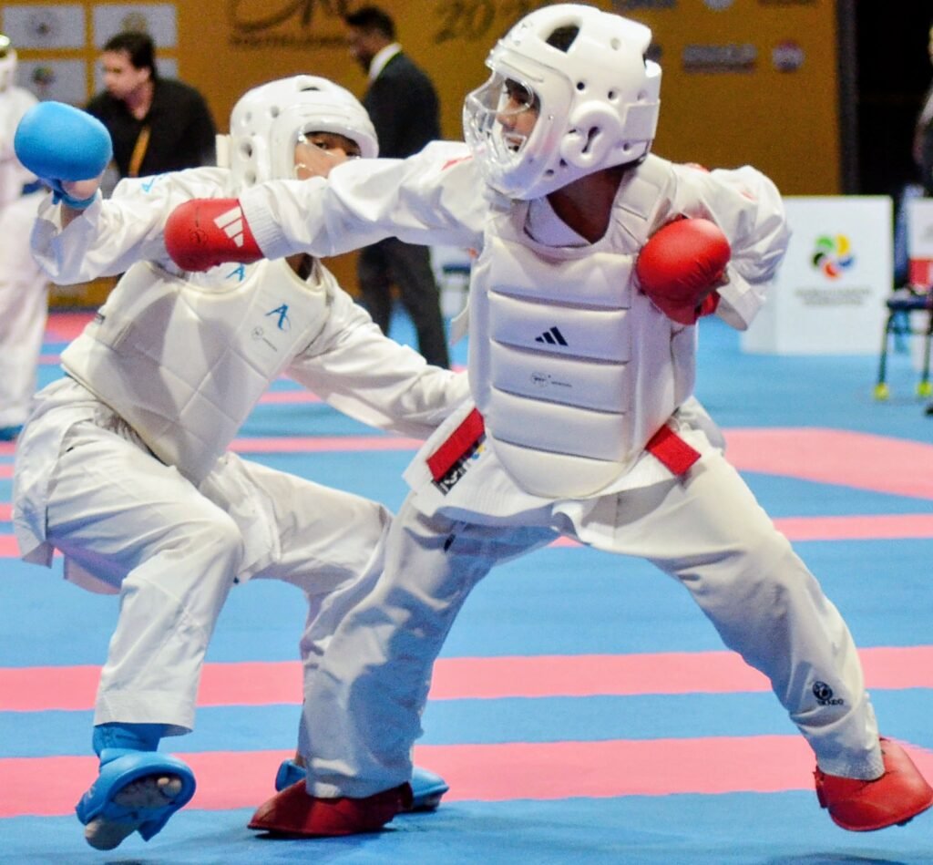 Francis Erl Jud Abundo connects with a punch to Brunei's Azlee Khairi bin Wan Zuraimi 7-0 to rule the under-14 male kumite -40-kilogram class of the Karare One-Youth League tournament yesterday at the SM Mall of Asia in Pasay City. [PSC photo]