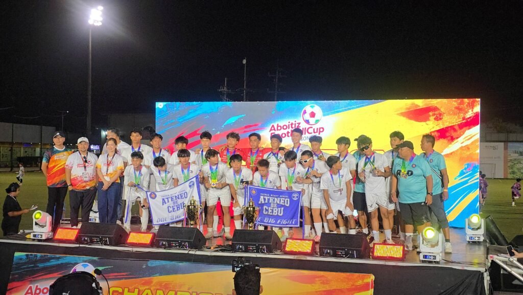 Sacred Heart School-Ateneo de Cebu celebrates double championship win at Aboitiz Football Cup.