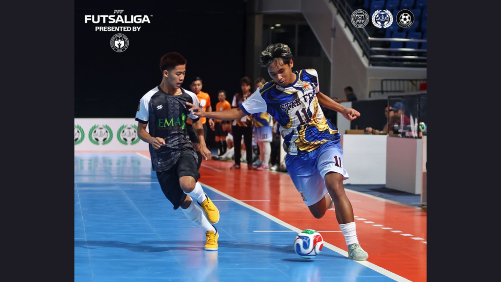 PFF Futsaliga U17 Boys' MVP Franc Obias (right) of Star FC runs past EMA Bulacan Highlanders' Jhon Kyle Balcos (left) in the finals. [Futsaliga photo]
