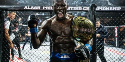 Nicholas Hwende celebrates after winning the BRAVE CF featherweight world championship in Almaty. [BRAVE CF photo]