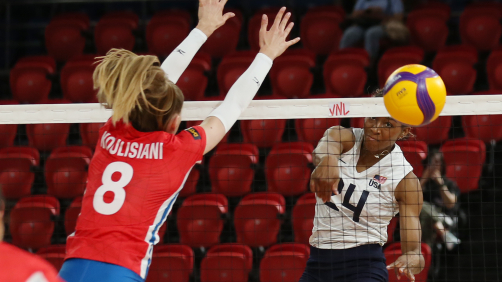 Chiaka Ogbogu at the net during international competition. [PSC photo]