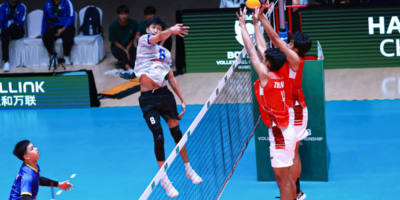 The Philippines' Terrence Marticion powers a kill past two Indonesian blockers as libero Clarenz Altoveros looks on during their AVC match. [Photo: AVC]