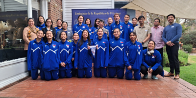 (Front) Jhenica Sadia, Resty Jane Olaguir, Taj Arkhea Teves, Frances Diane Ramos, Megan Yesha Hernandez, Sharina Rhyza Lleses, Cristina Madela Gale, Nadeth Faye Herbon, physiotherapist Hannah de Luna. (Rear) Jello Andrea Mauricio, mental performance coach Wynnette Bernardo, Princess Khaira Manzano, Irish May Mahinay, Jhaynna Love Bulandres, Ambassador Celeste Vinzon-Balatbat, Xyz Rayco, head coach Edwin Leyva, assistant coach Oliver Balse, Caera Celis with diplomatic staff at the Philippine embassy in Chile. [PSC photo]