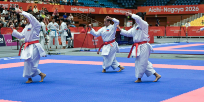 Rebecca Cyril Torres, Samantha Veguillas and Ysabelle Arrogante celebrate the Philippines' first Asian Games team kata bronze. [POC Media Pool]
