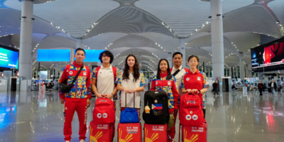 Swimmers Jamesray Michael Ajido and Riannah Chantelle Coleman, along with wushu athlete Angel Polo (second to fourth from left), pose with coaches Jensen Halili, Ramil Ilustre and Li Jianfang at Istanbul Airport. (POC Media Pool photo)